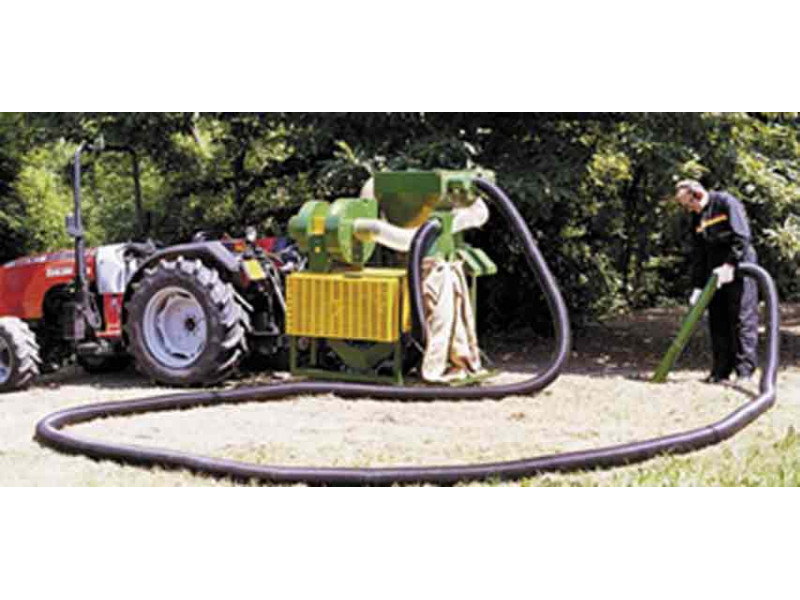 Pull-behind tractor vacuum harvester