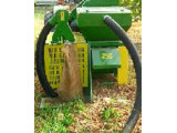 Pull-behind tractor vacuum harvester